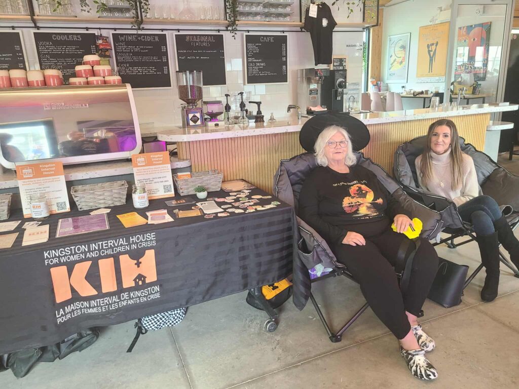 Kingston Interval House table with volunteers